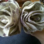 I have made a whole lot of these fabric flowers of sticks and, apart from making my wedding bouquet out of them, I'm still struggling to find a reason why